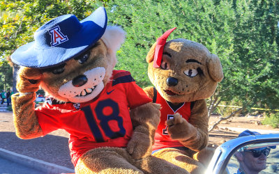 Wilber and Wilma Wildcat ride in the Homecoming Parade