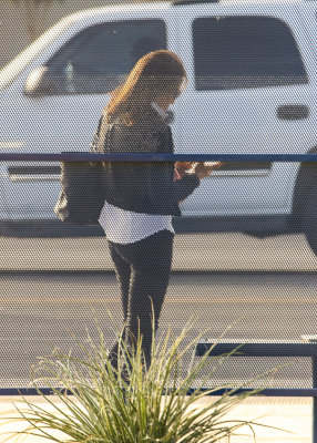 Woman waiting for a bus in Tucson Arizona