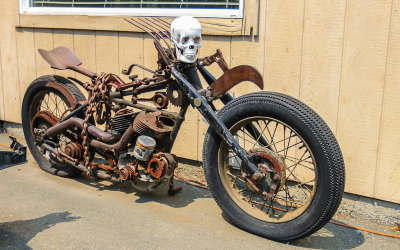 Old rusted motorcycle at a Napa Valley shop