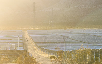 Late afternoon sunlight floods a Solar Farm near California City California