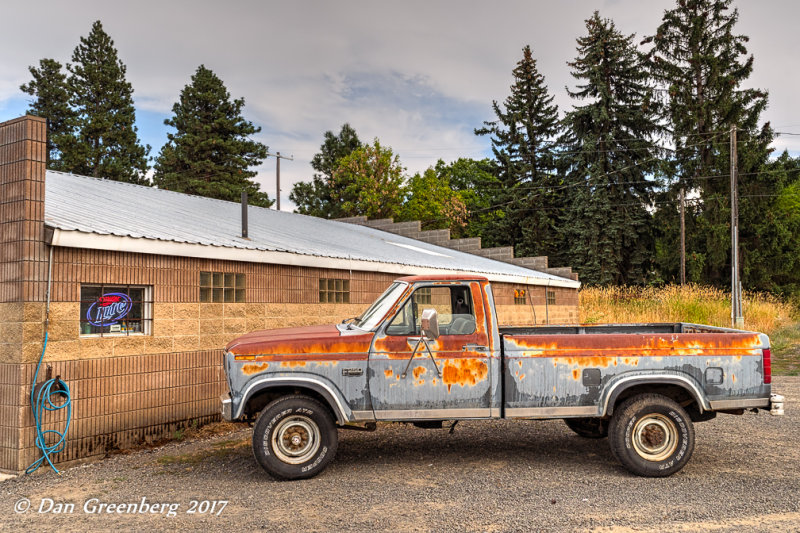 Old Ford Pickup by a Liquor Store