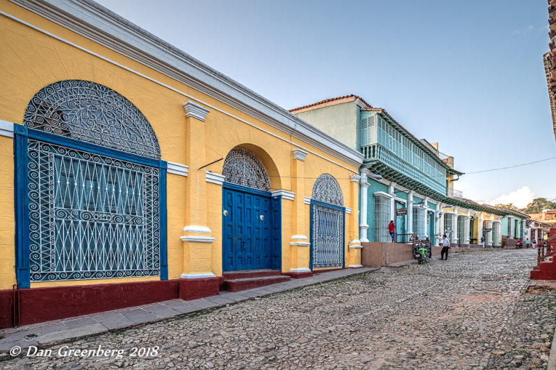 Blue Doors on a Cobblestone Street