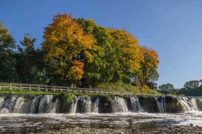 Venta waterfall pours below autumn-coloured Kuldiga 