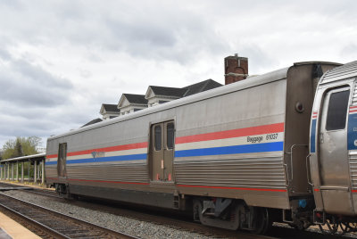 61037