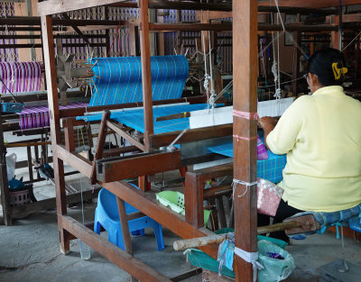 7-Mon Village weaver at loom