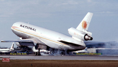 1979 - National Airlines DC10-30 N83NA smoky touchdown upon landing at Miami International Airport aviation airline photo
