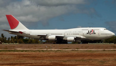 2009 - Japan Air Lines B747-446 JA8901 taxiing out for takeoff on the reef runway at Honolulu International Airport