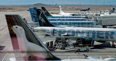 2007 - a gaggle of Frontier Airbus A320's on the gates at Denver International Airport
