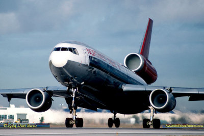 1984 - Northwest Airlines DC10-40 taking off on runway 12 at Miami International Airport aviation airline photo