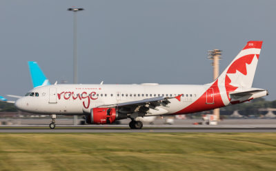 Air Canada Rouge A-319 lands at YUL