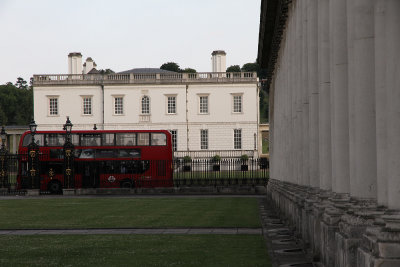 A red bus passes Queen's House in Greenwich