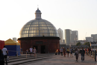 Greenwich Pier around 8:30 in the evening.  The round dome houses steps down to a pedestrian tunnel under the Thames