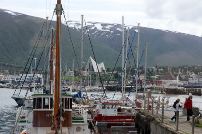 I took a walk along the waterfront. Here's harbor at Tromso with cathedral across the bridge.  Funicular was also over there. 