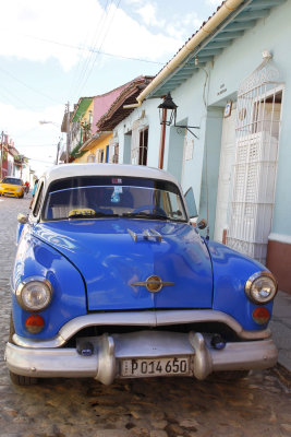 Another blue car.  Many were taxis. 