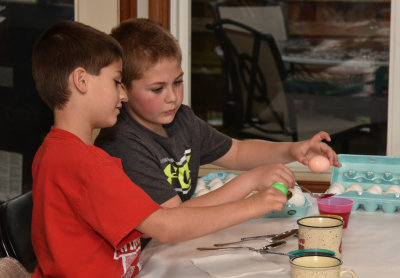 Cousins Coloring Easter Eggs