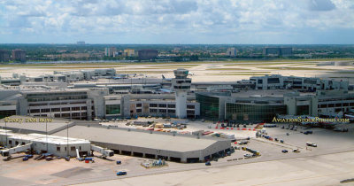 2007 - aerial stock photo of old Concourse C, temporary Concourse C bag sheds, and D-Tower at Miami International Airport