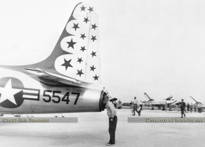 1957 - Erik Simonsen's younger brother Alan peering into a Thunderbird T-33A exhaust nozzle at MCAS Miami Masters Field Air Show