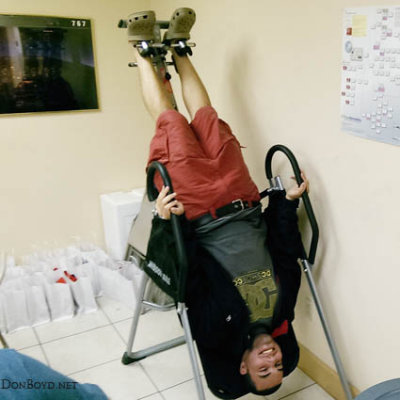 January 2015 - Luimer Cordero trying out an inversion bed at Vic Lopez's shop in Doral