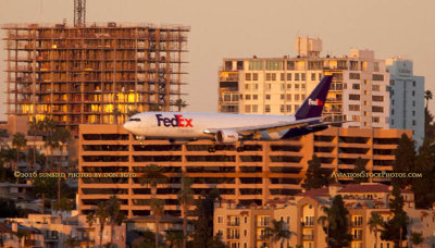 2016 - closeup version of FedEx Boeing B777F on short final approach to SAN at sunset