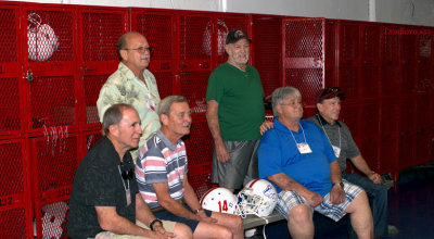 Joe Elizarde, Nick Royer, Mike Turner and John Lund (front row) in the old locker room during the HHS-65 50-Year Reunion