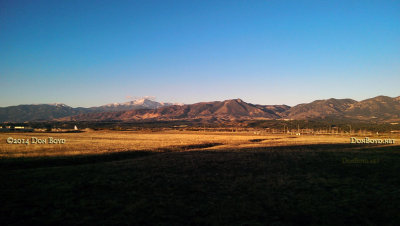 October 2014 - the front range and Pike's Peak in early morning sun from field next to Marriott Residence Inn North - Academy