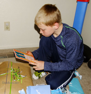 April 2016 - our grandson Kyler reading our birthday card on his 11th birthday in Colorado Springs