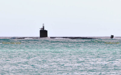 2010 - a small Navy submarine passing offshore from the oceanfront lunch bar at Hickam Air Force Base