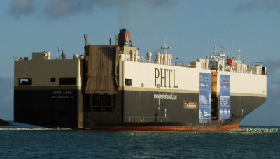M/V Jean Anne, a pure car/truck carrier (PCTC) out of San Francisco, leaving Honolulu Harbor lightly loaded at sunset