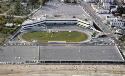 Early 1970's - aerial view of Miami Beach Kennel Club and the parking garage that beach goers used to park