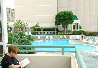 August 2010 - Karen reading yet another book by the pool at the Hawaiian Prince Hotel at the Honolulu Marina