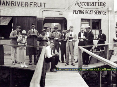 1920-1924 - Aeromarine Airways staff members dining on ice cream from an unclaimed flight shipment