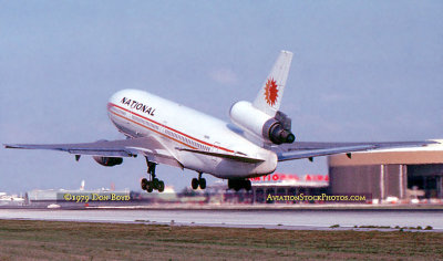 May 1979 - National Airlines DC10-30 taking off on 9L at Miami with National's headquarters and maintenance base on the right