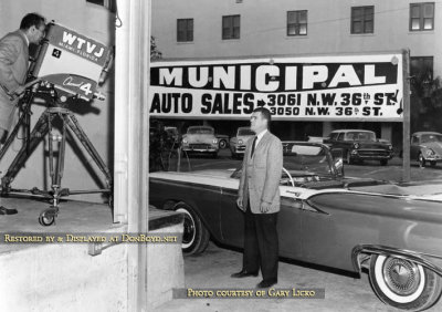 Jack O'Brien doing a live commercial for Municipal Auto Sales in the back lot of WTVJ-TV Channel 4 (Jack's story below)