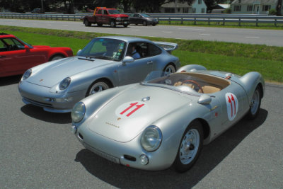 A 993-generation Porsche 911 sits next to a very good replica of a 1955 Porsche 550 Spyder. (1053)