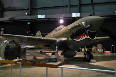 Curtiss P-40E Warhawk: P-40s engaged Japanese aircraft at Pearl Harbor and in the Philippines in December 1941. (8078)