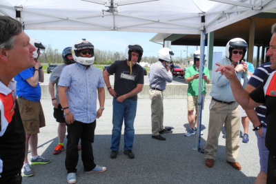 Vu Nguyen (in black pants), Porsche Club of America's executive director, and others get ready for some spirited driving. (2625)