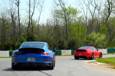 2018 Porsche 911 T leads a 2018 911 4S around the race track. (2710)