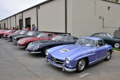 1954 Mercedes-Benz 300SL Gullwing next to classic Ferraris from the 1960s (5751)