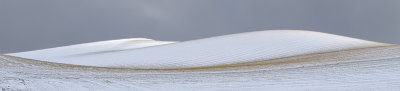 Lite snö på de mjuka, böljande kullarna