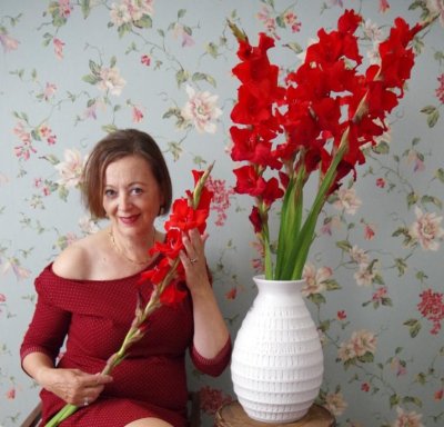 Woman with gladiolus