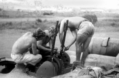 B-24 Top turret gun maintenance ~ Papua New Guinea  1943+