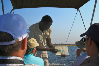 Our Guide on the Sun-setter Delta Boat