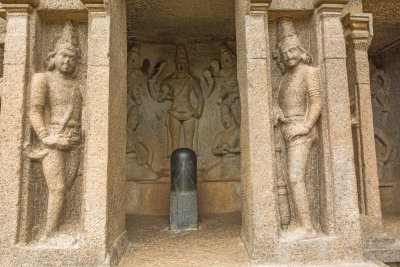 Shiva Linga and carved statues surrounding it