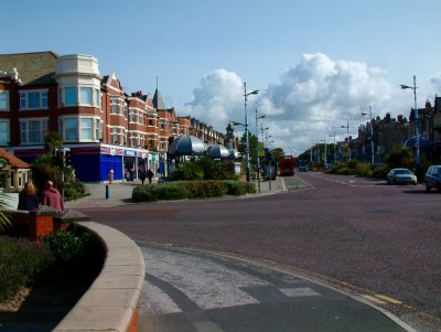 The Building on the corner with the Blue shutters is on what used to be known as Woolworths Corner, Woolworths now long gone.