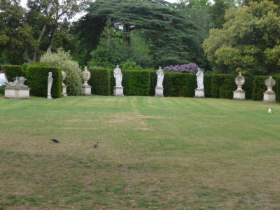 Longer view of statues in Exedra designed by William Kent