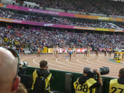 Competitors finishing their 1500 metres heat