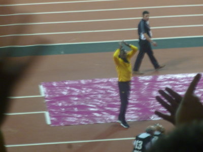 Usain Bolt acknowledging supporters during his farewell lap