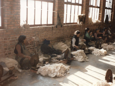 Tibetan refugee camp making rugs. I still have one!