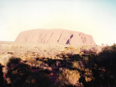 Ayers Rock at sunset gradually changing colour