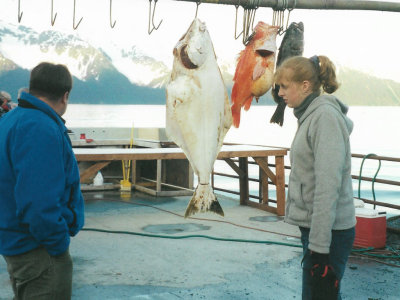 Inspecting recently caught fish on the quayside